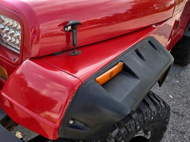 Photo of 1995 Red Jeep Wrangler