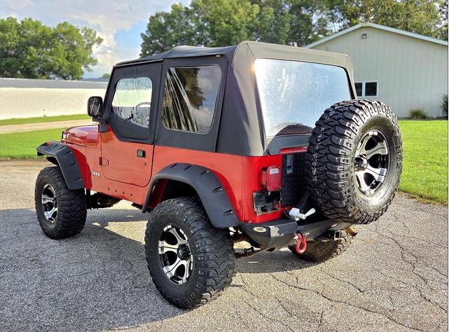 Photo of 1995 Red Jeep Wrangler