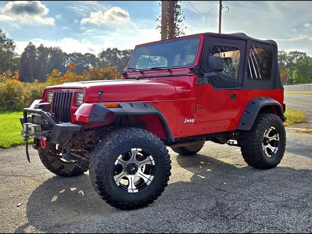 Photo of 1995 Red Jeep Wrangler