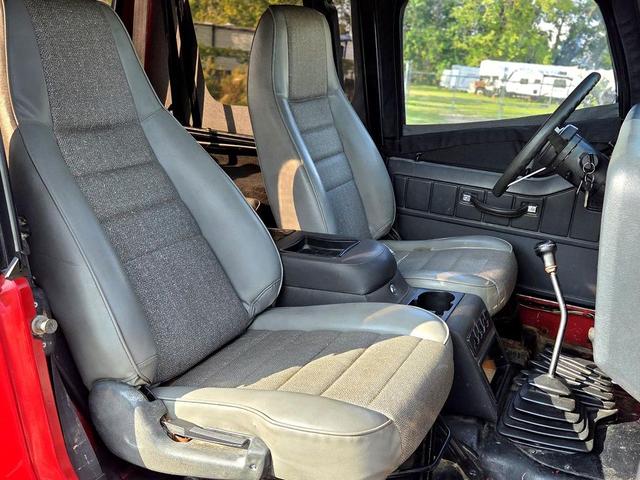 Photo of 1995 Red Jeep Wrangler