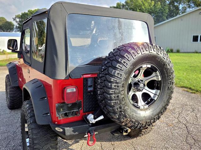 Photo of 1995 Red Jeep Wrangler