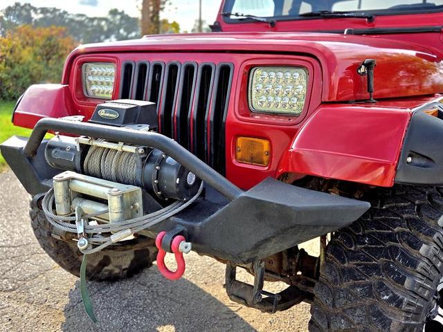 Photo of 1995 Red Jeep Wrangler
