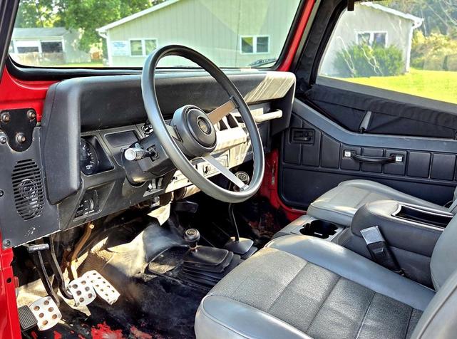 Photo of 1995 Red Jeep Wrangler