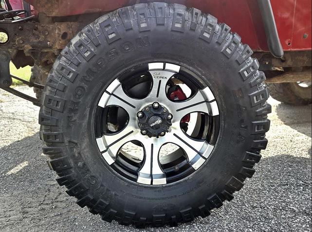Photo of 1995 Red Jeep Wrangler