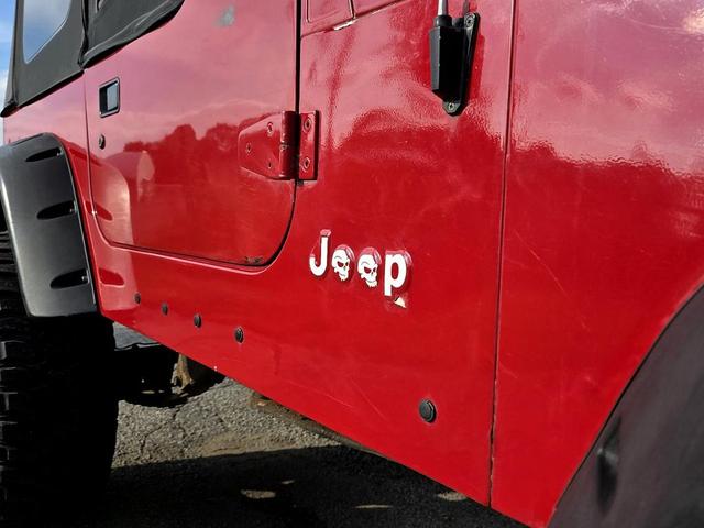 Photo of 1995 Red Jeep Wrangler