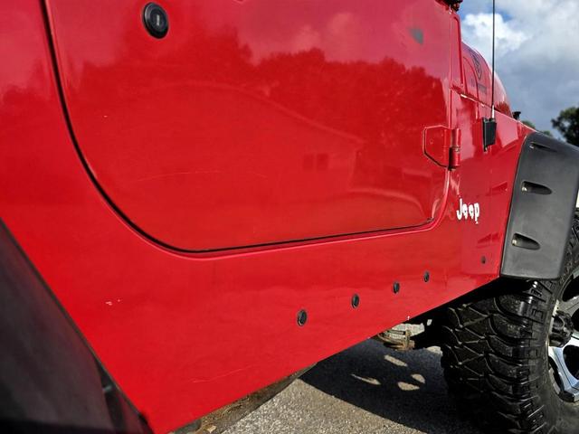 Photo of 1995 Red Jeep Wrangler