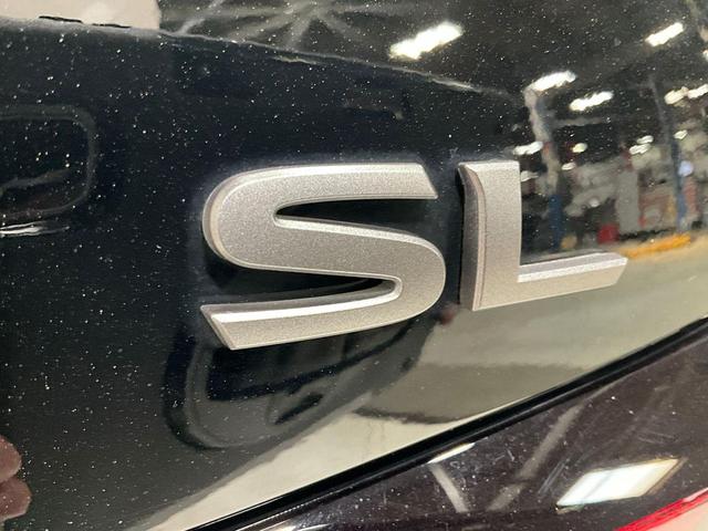 Photo of 2024 Super Black Clearcoat Nissan Altima