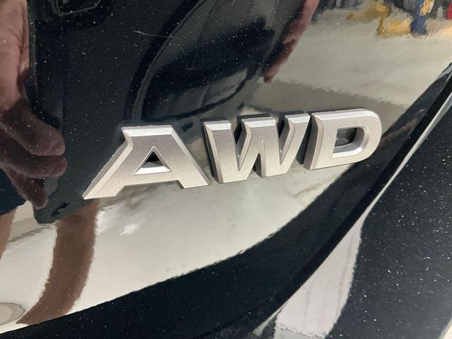 Photo of 2024 Super Black Clearcoat Nissan Altima