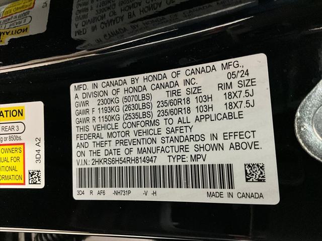 Photo of 2024 Platinum White Pearl Honda CR-V Hybrid