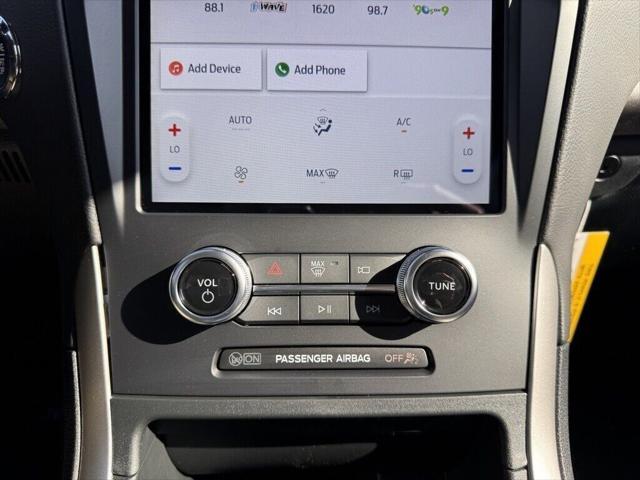 Photo of 2024 Stone Blue Metallic Ford Edge