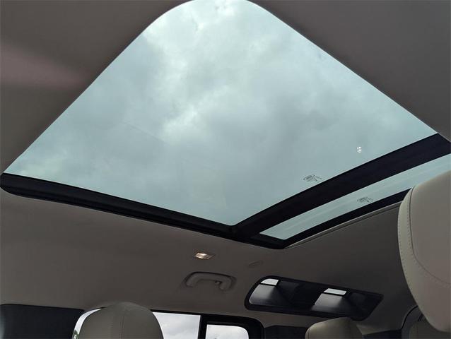 Photo of 2024 Tasman Blue Metallic Land Rover Defender