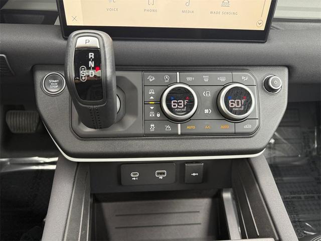 Photo of 2023 Sedona Red Land Rover Defender