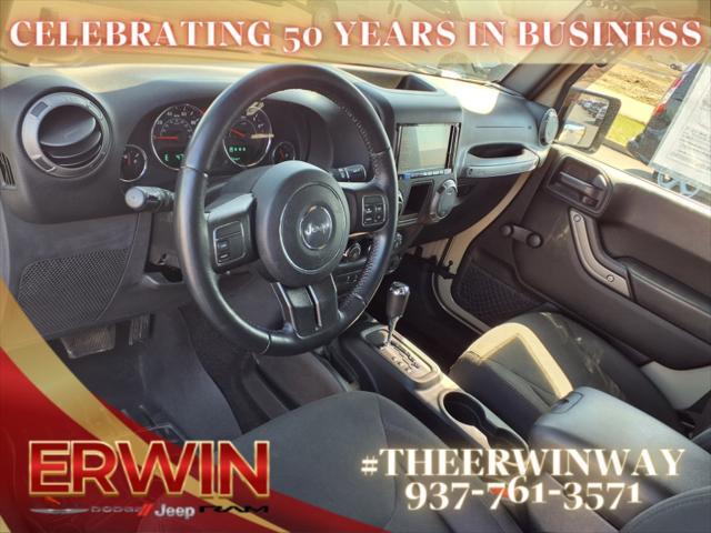Photo of 2017 Tan Jeep Wrangler