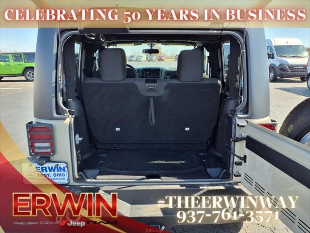 Photo of 2017 Tan Jeep Wrangler
