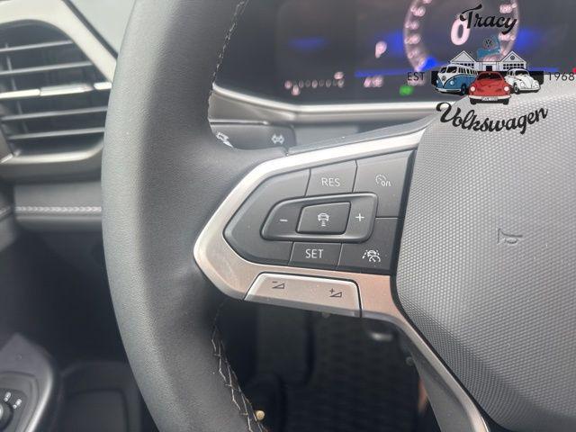 Photo of 2025 Cornflower Blue w/Deep Black Roof Volkswagen Taos