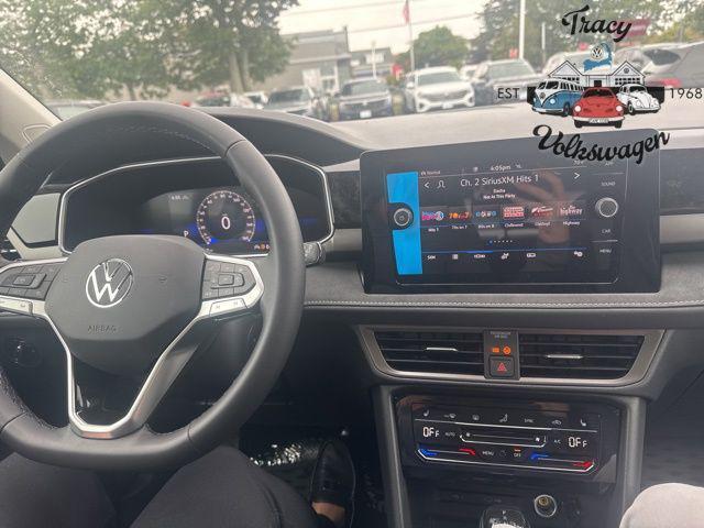 Photo of 2025 Cornflower Blue w/Deep Black Roof Volkswagen Taos
