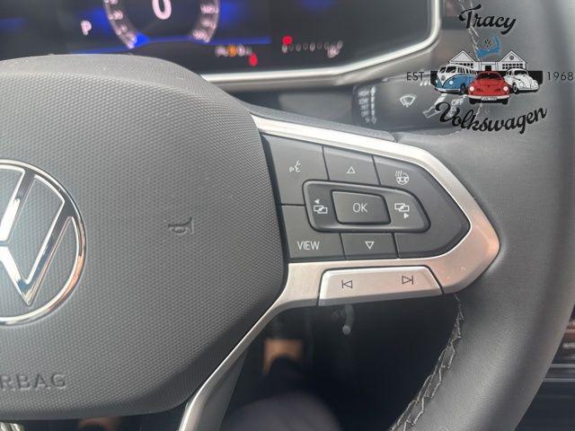 Photo of 2025 Cornflower Blue w/Deep Black Roof Volkswagen Taos