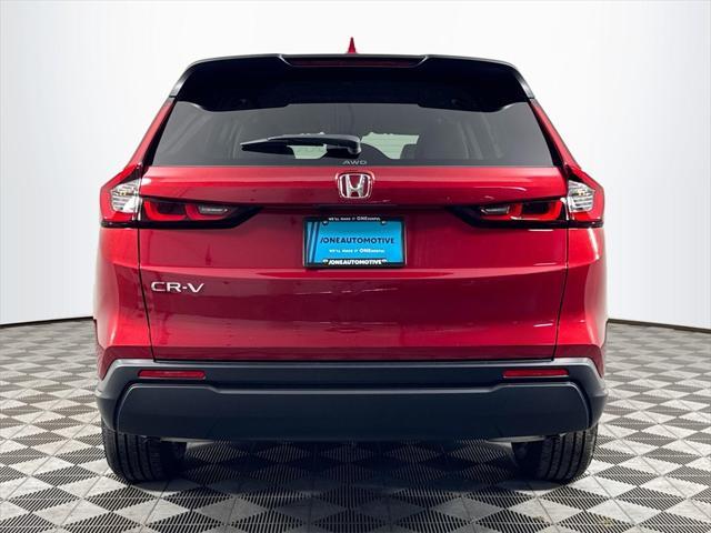 Photo of 2025 Radiant Red Metallic Honda CR-V