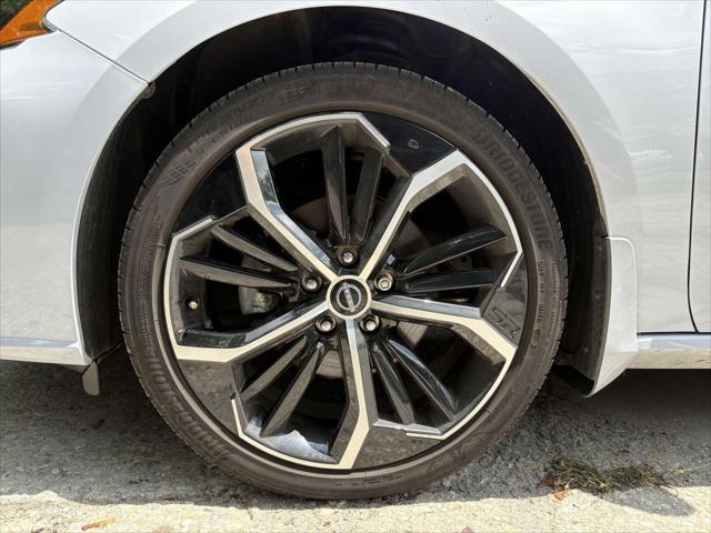 Photo of 2024 Gray Sky Pearl Nissan Altima