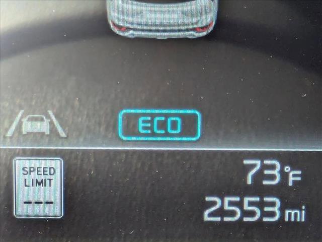 Photo of 2025 Cityscape Green Kia Niro