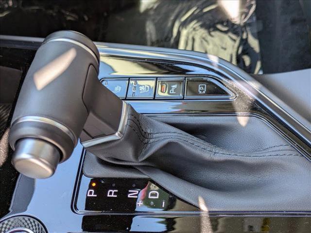 Photo of 2025 Cityscape Green Kia Niro