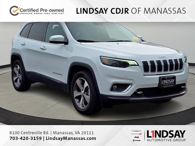 Photo of 2021 Bright White Clearcoat Jeep Cherokee