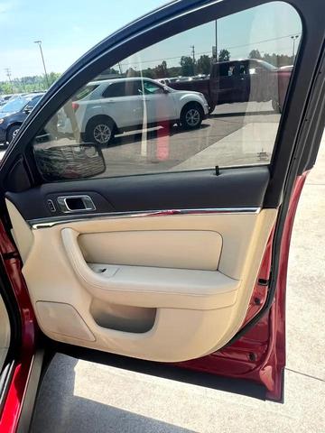 Photo of 2015 Ruby Red Metallic Tinted Clearcoat Lincoln MKS