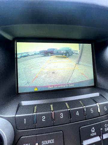 Photo of 2015 Crystal Red Tintcoat Chevrolet Equinox