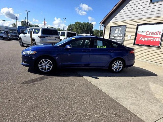Photo of 2013 Deep Impact Blue Ford Fusion