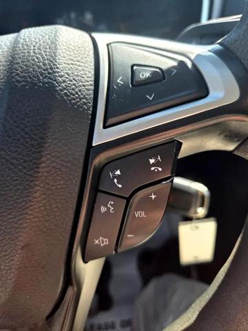 Photo of 2013 Deep Impact Blue Ford Fusion