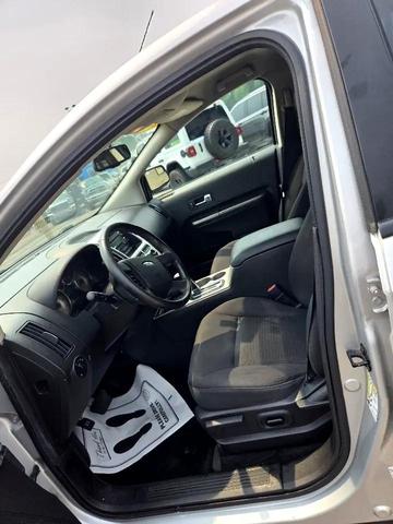 Photo of 2010 Ingot Silver Metallic Ford Edge