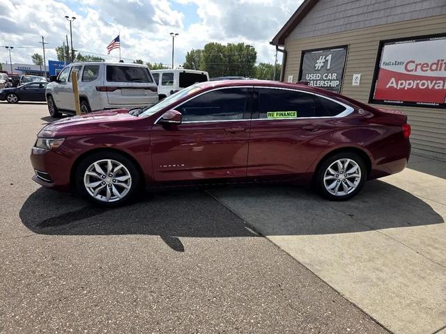 Photo of 2016 Siren Red Tintcoat Chevrolet Impala