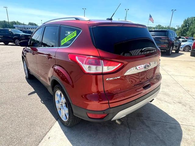 Photo of 2015 Ruby Red Metallic Tinted Clearcoat Ford Escape