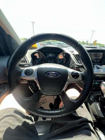 Photo of 2015 Ruby Red Metallic Tinted Clearcoat Ford Escape
