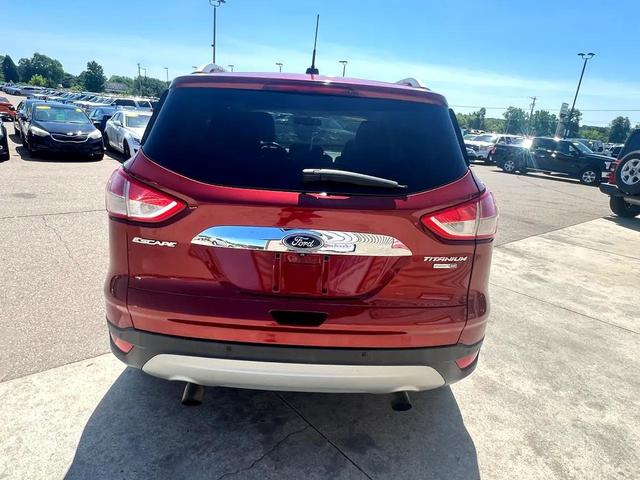Photo of 2015 Ruby Red Metallic Tinted Clearcoat Ford Escape