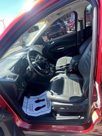Photo of 2015 Ruby Red Metallic Tinted Clearcoat Ford Escape