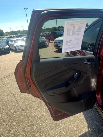 Photo of 2015 Ruby Red Metallic Tinted Clearcoat Ford Escape