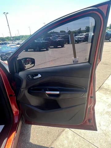 Photo of 2015 Ruby Red Metallic Tinted Clearcoat Ford Escape