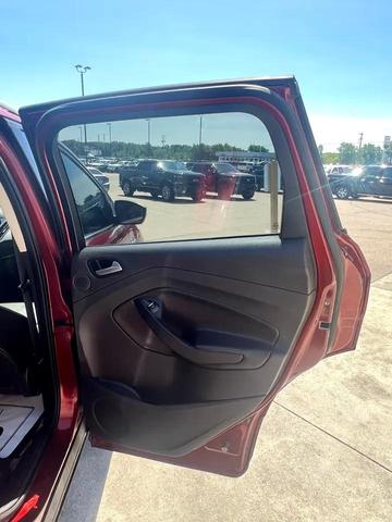 Photo of 2015 Ruby Red Metallic Tinted Clearcoat Ford Escape