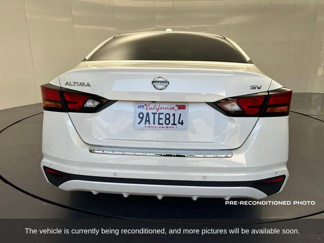 Photo of 2021 Pearl White Tricoat Nissan Altima