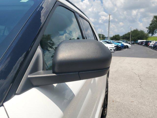 Photo of 2021 STAR WHITE MET TRI-COAT Ford Explorer