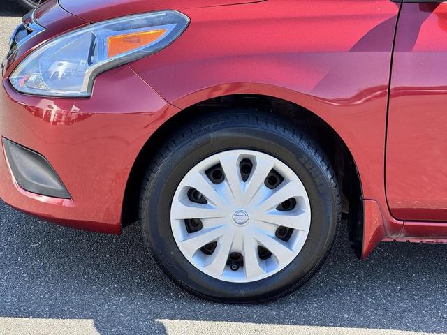 Photo of 2016 Cayenne Red Nissan Versa