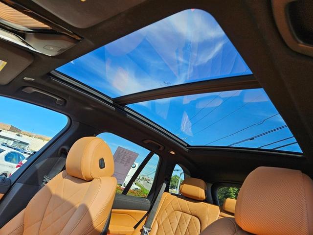 Photo of 2023 Manhattan Green Metallic BMW X5
