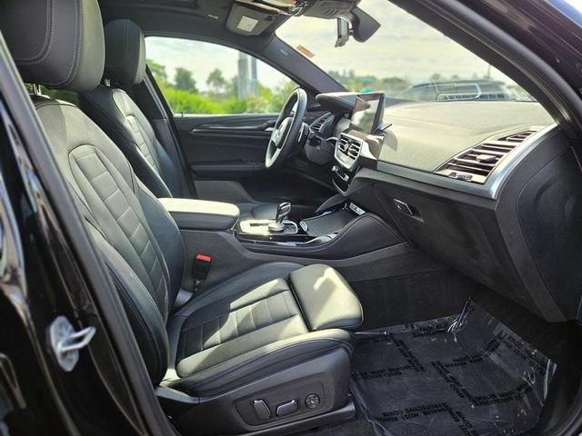 Photo of 2024 Black Sapphire Metallic BMW X4