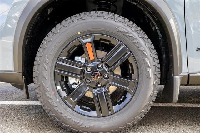 Photo of 2025 Boulder Gray Nissan Rogue