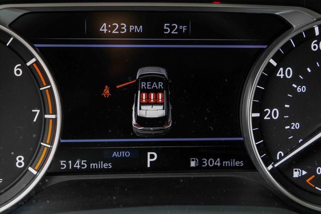 Photo of 2023 Scarlet Ember Tintcoat Nissan Rogue