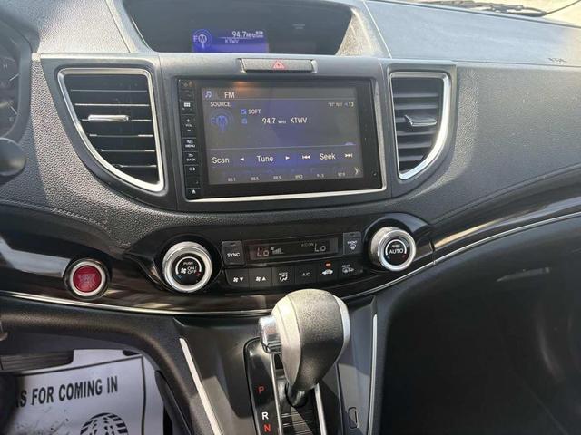Photo of 2016 White Diamond Pearl Honda CR-V