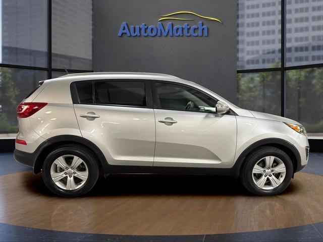 Photo of 2013 Bright Silver Kia Sportage