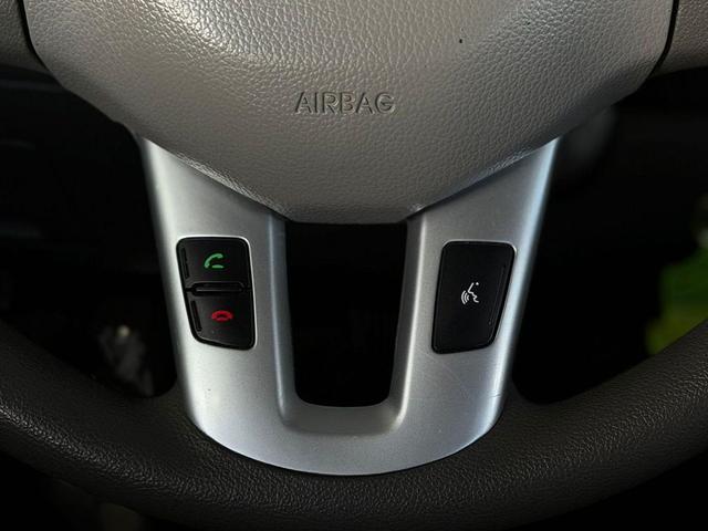 Photo of 2013 Bright Silver Kia Sportage