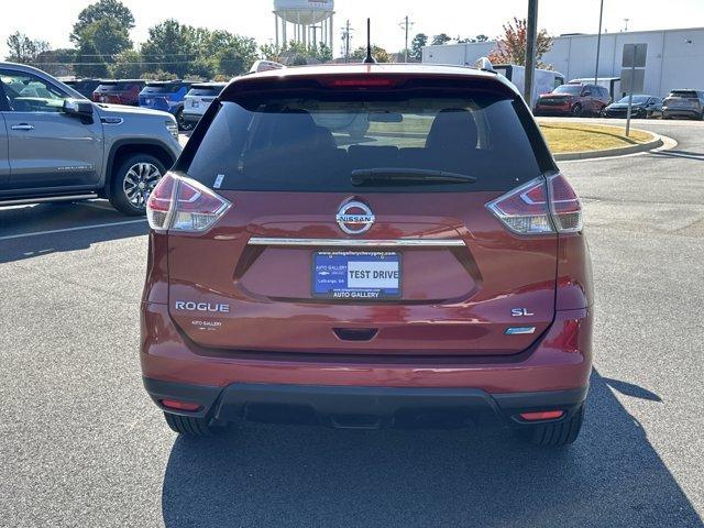 Photo of 2014 Cayenne Red Nissan Rogue